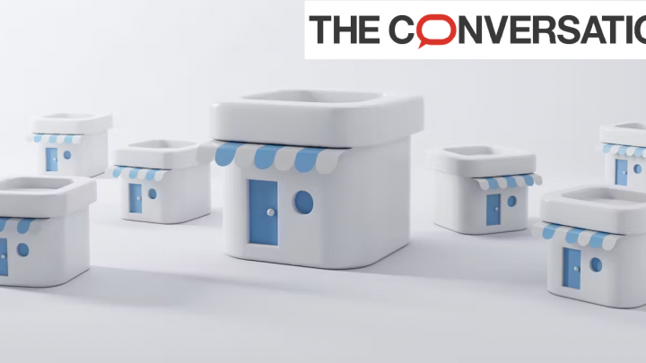 Image représentant un grand magasin entouré de plus petits magasins franchisés